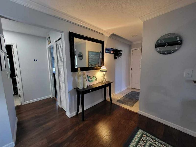 Entry showing dining area and hallway