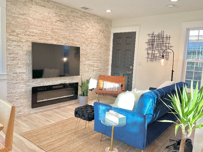 Living room with fireplace and smart TV