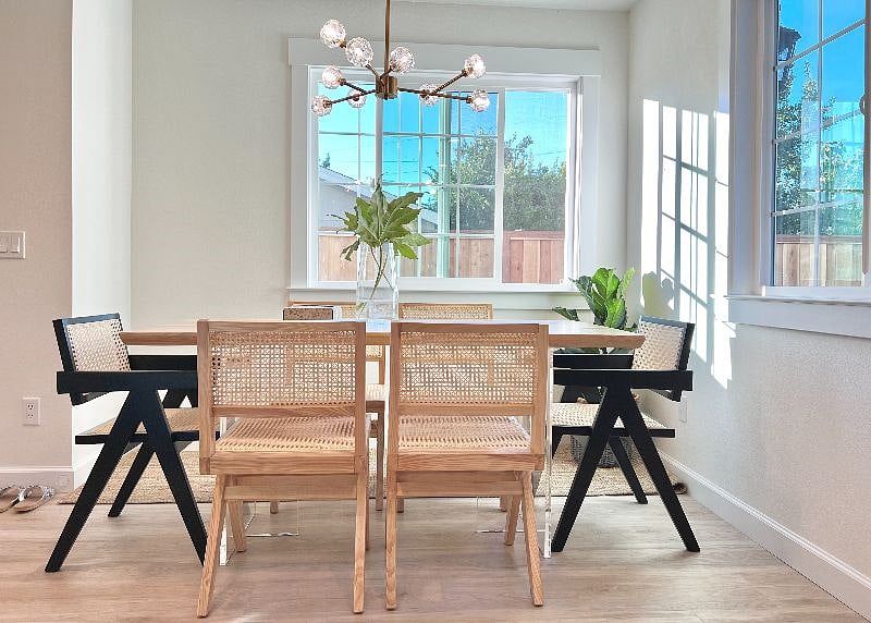 Solid live-edge dining table and designer Chandigarh chairs for 6