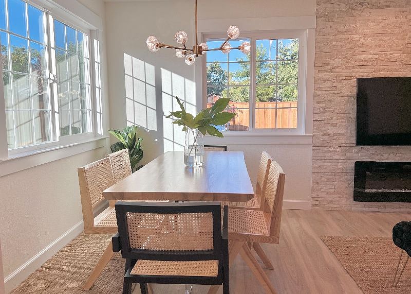 Solid live-edge dining table and designer Chandigarh chairs for 6