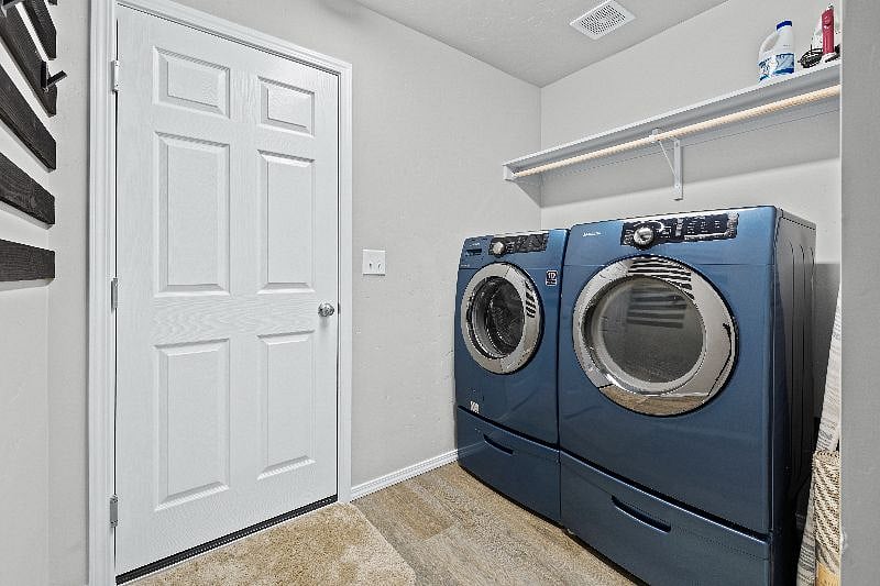 Full size front load washer and dryer for your use, conveniently located right off the garage. Starter supplies included