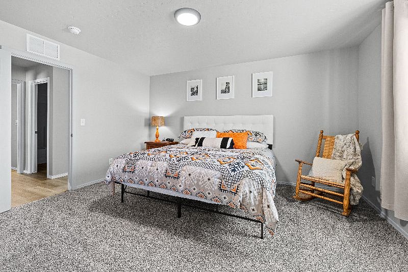 Exceptional main suite! Includes king bed, luxurious bedding, 55" Smart TV, black out curtains, plenty of dresser storage