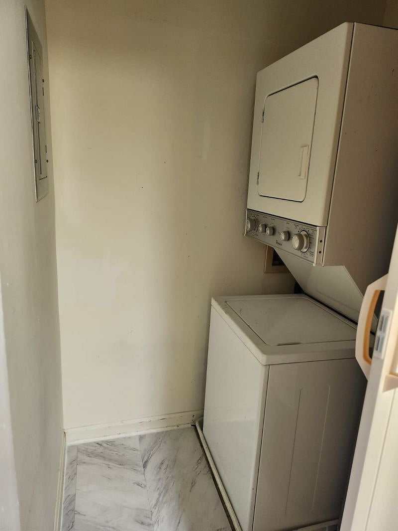 Laundry room in unit 