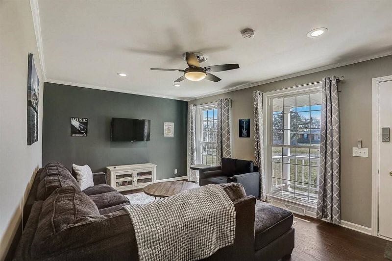 This is the living space you walk into from the front door. It includes a very comfortable sofa and coffee table.