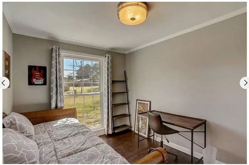 Bedroom number three includes a trundle bed and sleeps two once the bed is rolled out. It also has an armoir for hanging and storage.
