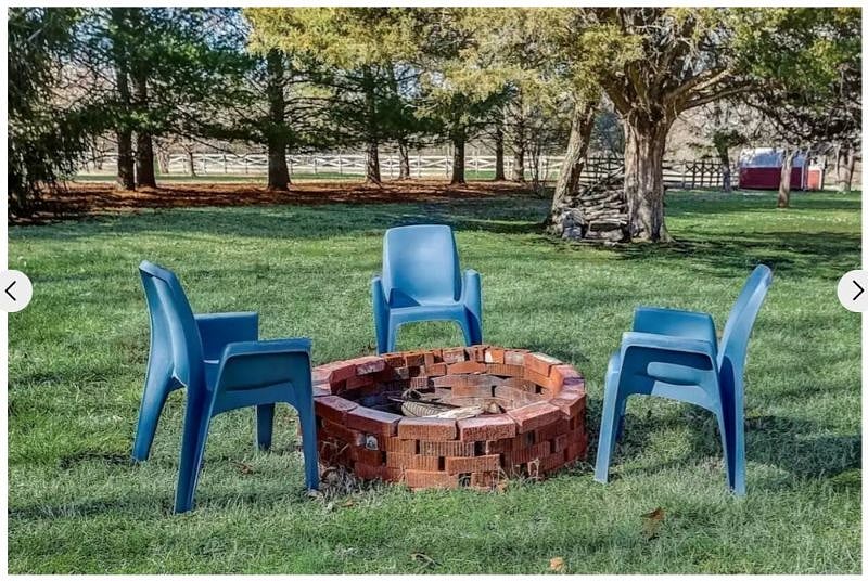 Firepit for your use. Chairs are stacked in the garageD