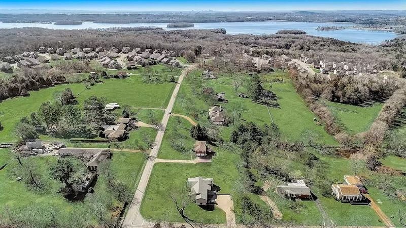 Drone photos of the house showing proximity to the lake and the beauty of the area