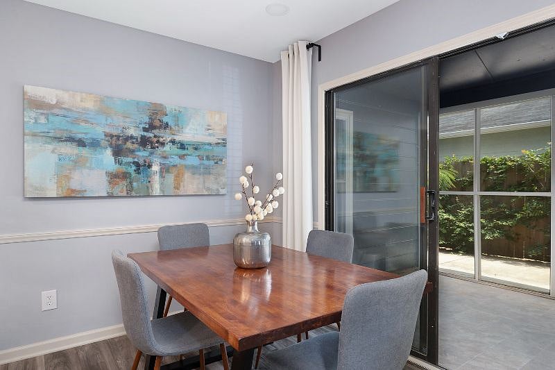 The living room takes you to the side yard.