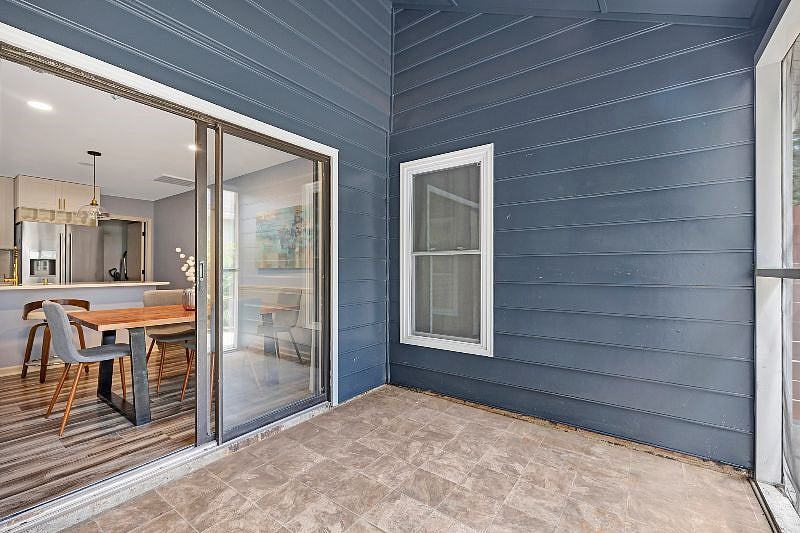 The covered patio takes you to the side yard.