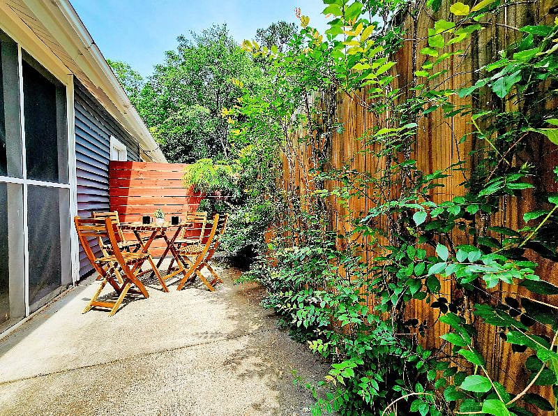 Cute side yard, perfect for your morning cup of coffee, or evening glass of wine!
