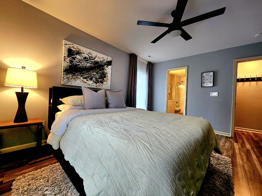 Master suite with bathroom and walk-in closet.