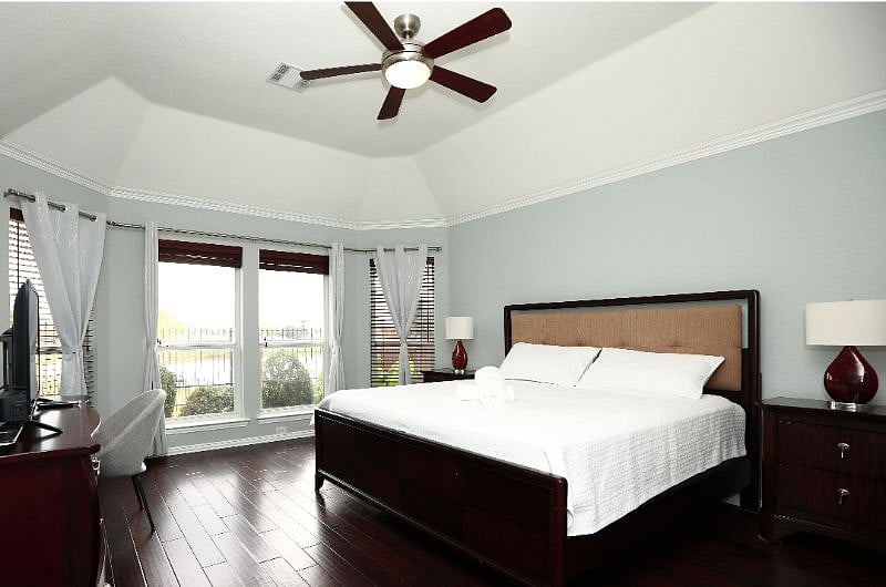 Master bedroom (King Bed) with bay window & a view to community lake