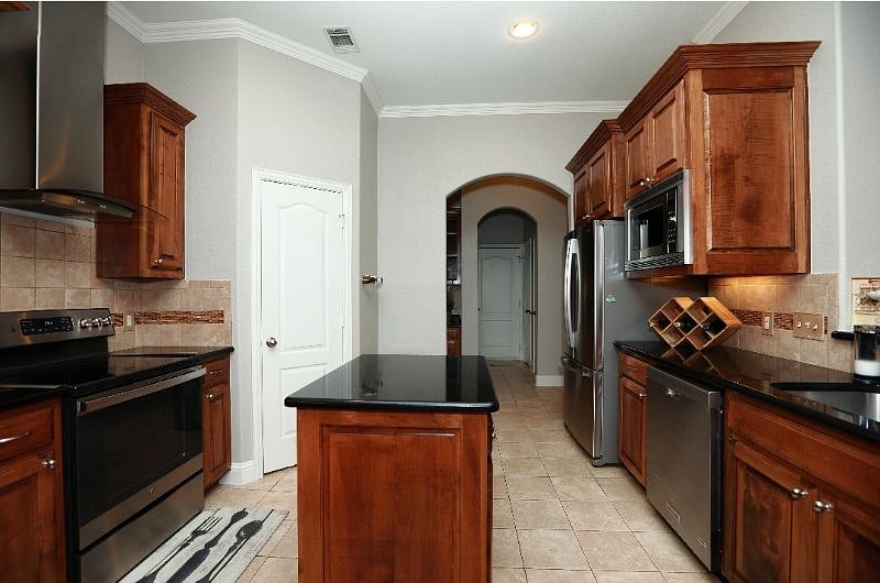 Spacious French Door Refrigerator, microwave, and dishwasher