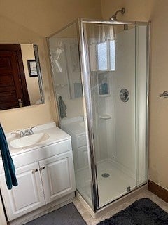 Bathroom with vanity and shower