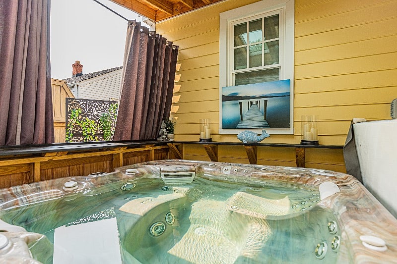 Enjoy the therapeutic benefits of soaking in the salt water hot tub.