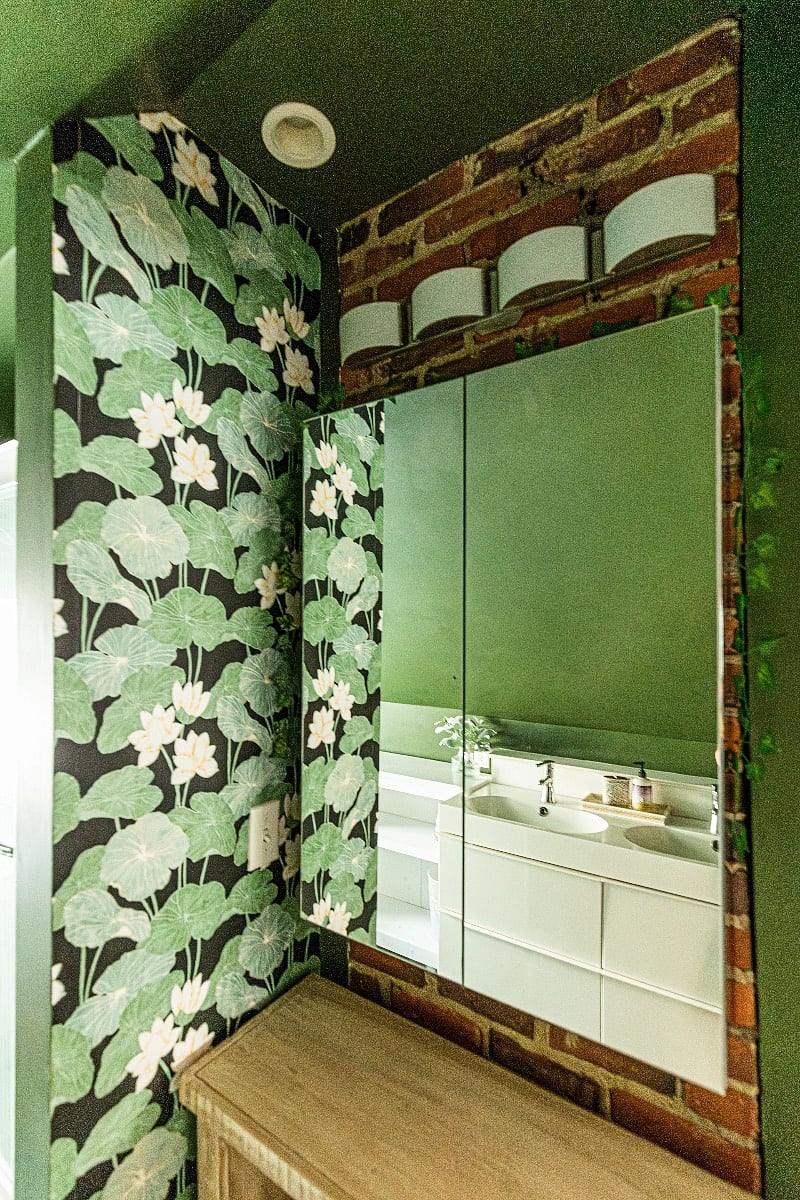 Elegant bathroom with lily pads and a dedicated make-up vanity.