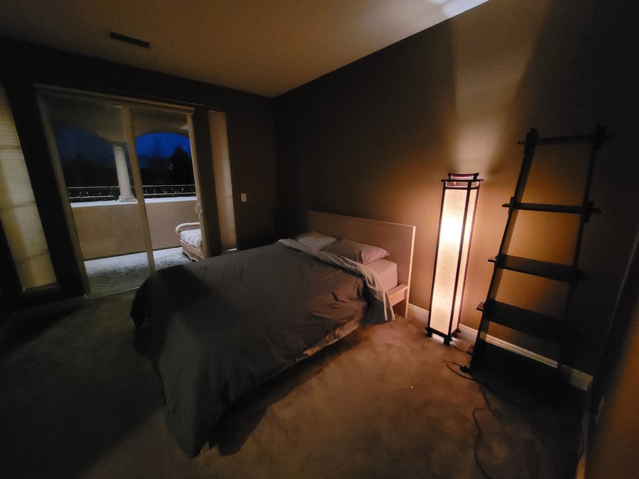 Upstairs bedroom two, queen bed with private patio.