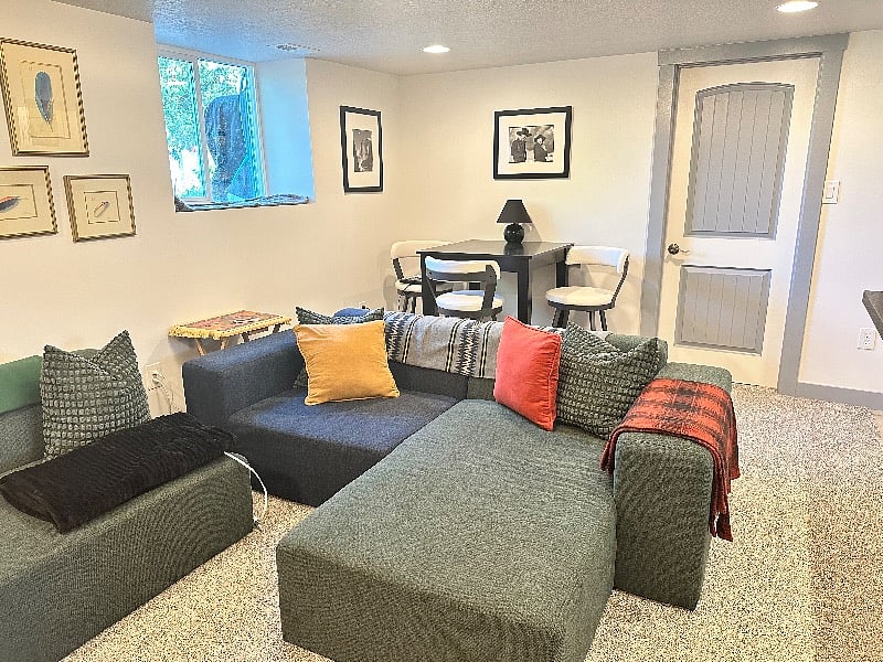 Great room dining and door to bedroom.