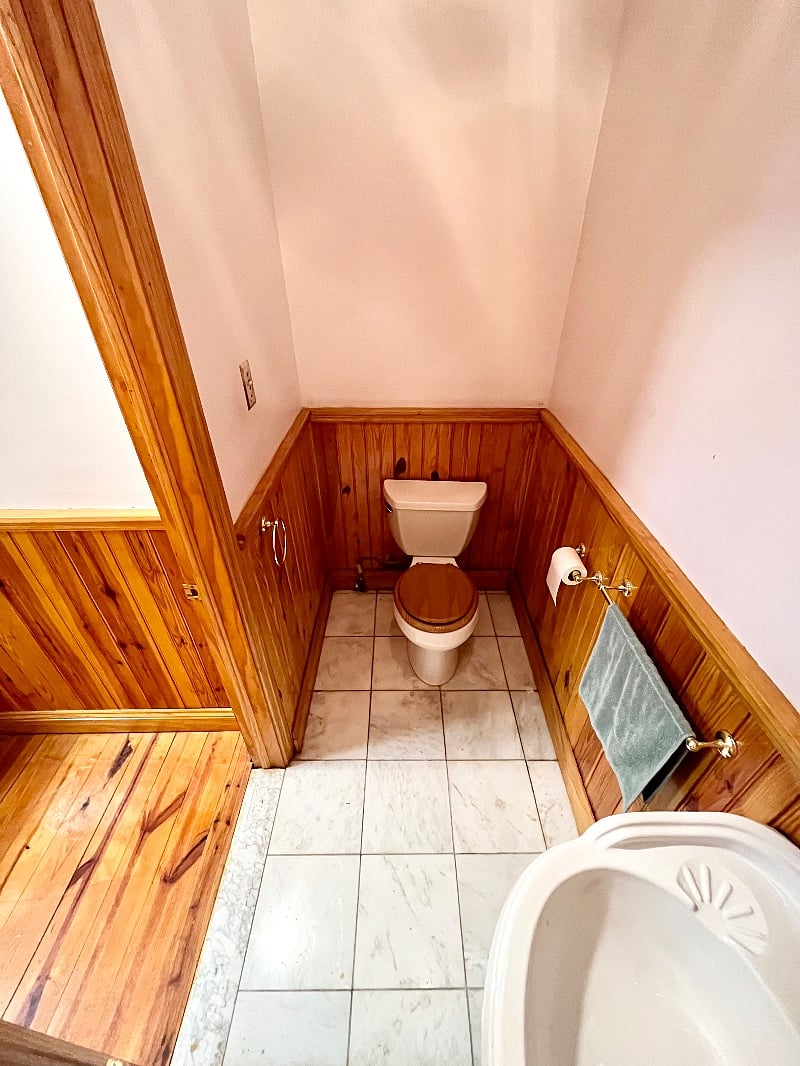 Half bathroom (toilet & sink) in front living room/office area