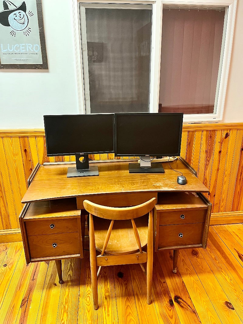 Desk in front living room/office area