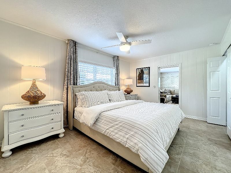 Downstairs King Bedroom/pocket door to Family room