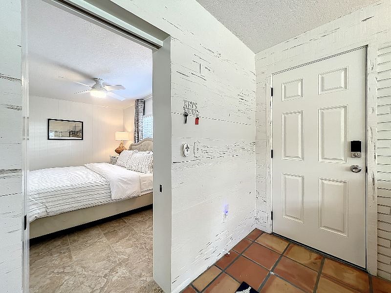 Front door/Pocket door to downstairs bedroom