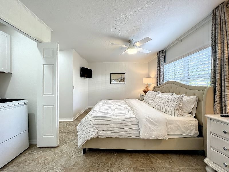 Downstairs king Bedroom with TV