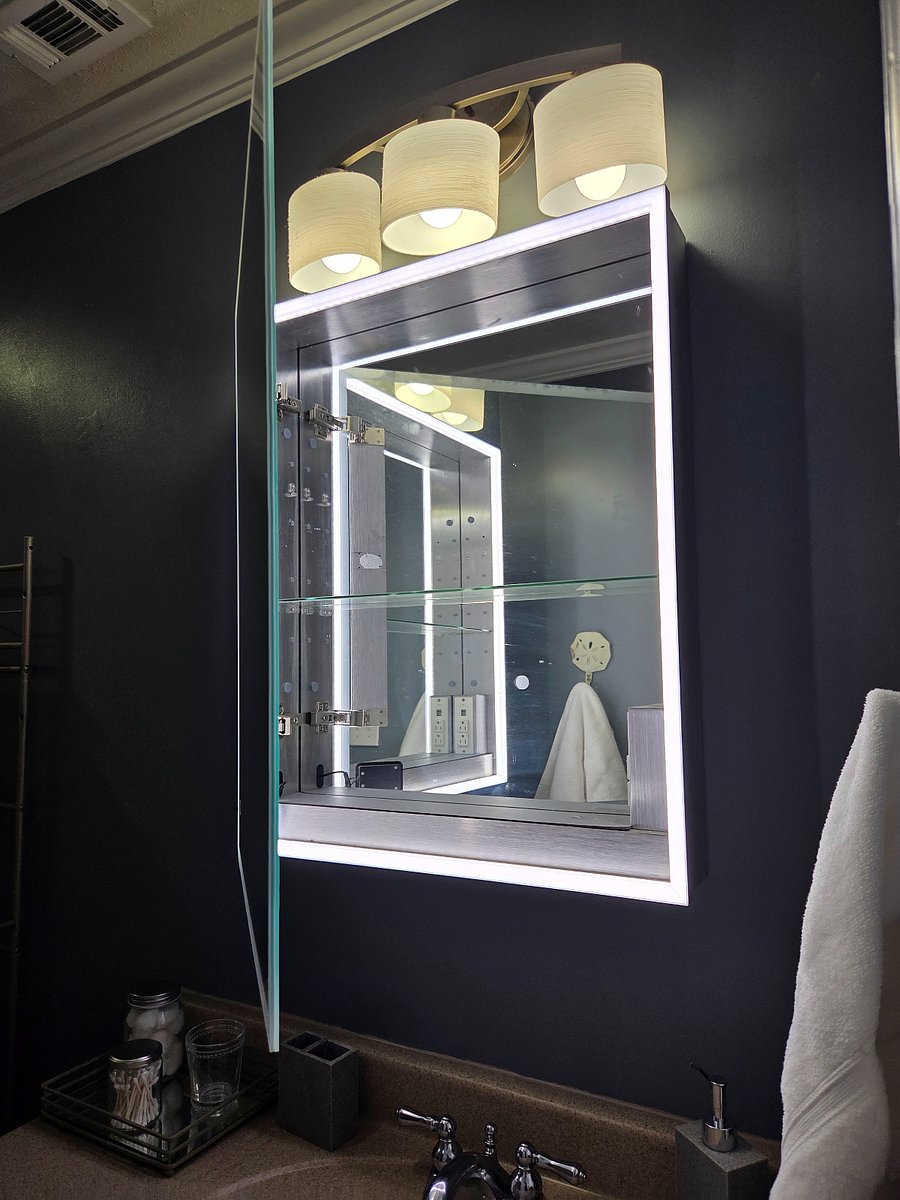Lit mirror with a mirror inside
