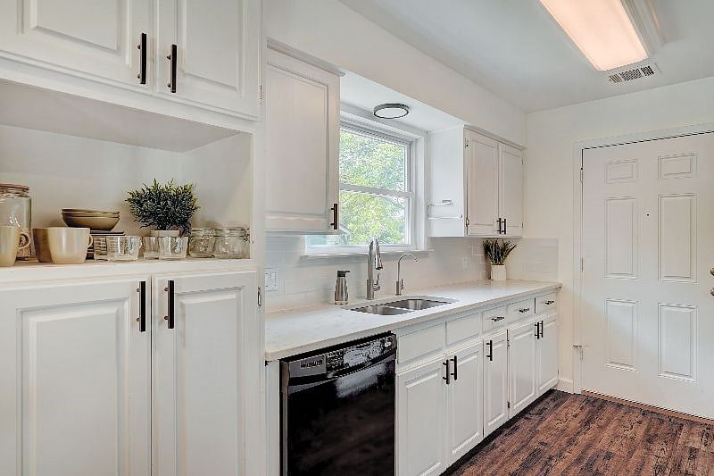 Fully stocked kitchen with dishes, utensils, cookware, and appliances. Additionally, a kitchen aid mixer, toaster, and instant pot are provided to fulfill all your cooking needs.