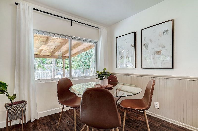 Modern dining table with views out to your backyard oasis