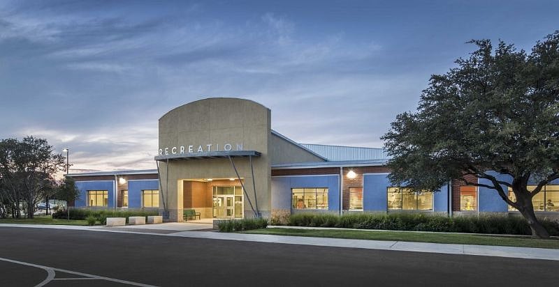 Neighborhood community center with countless amenities including weight room, fitness classes, and sports courts