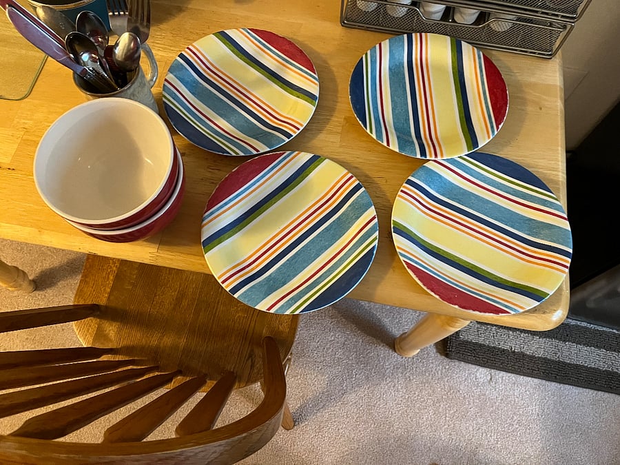 Fully furnished dishes, pots and pans, silverware.