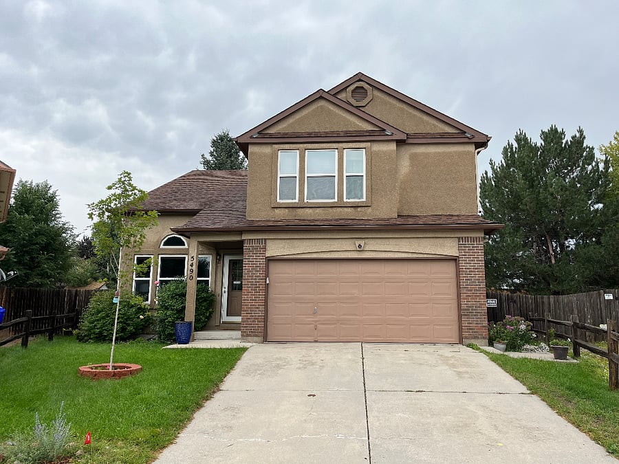 Front view of house. Parking on driveway permitted.