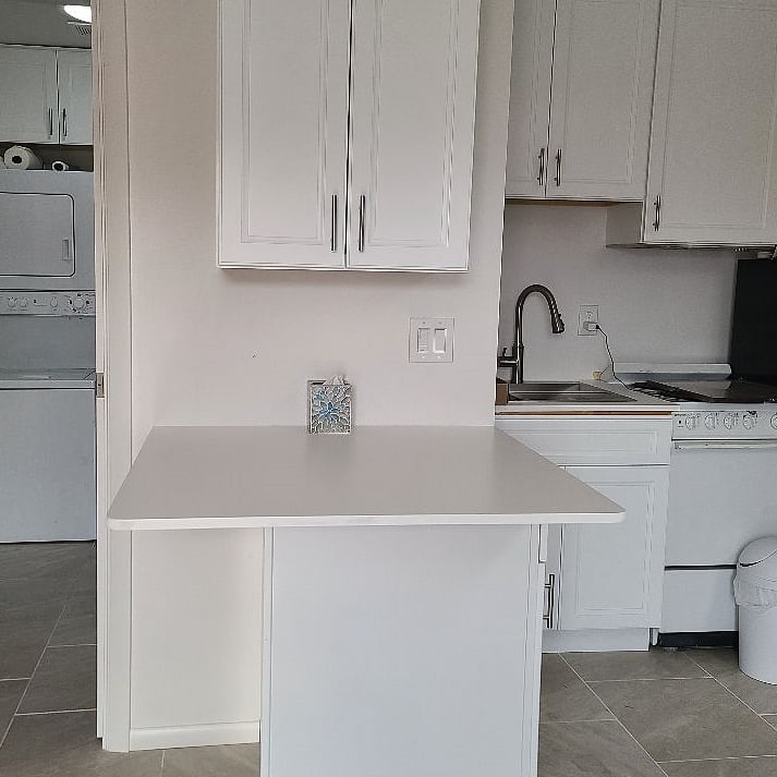 Not pictured is the skylight, ceiling fan, minisplit (A/C & heater) and barstool(s) at the countertop.
