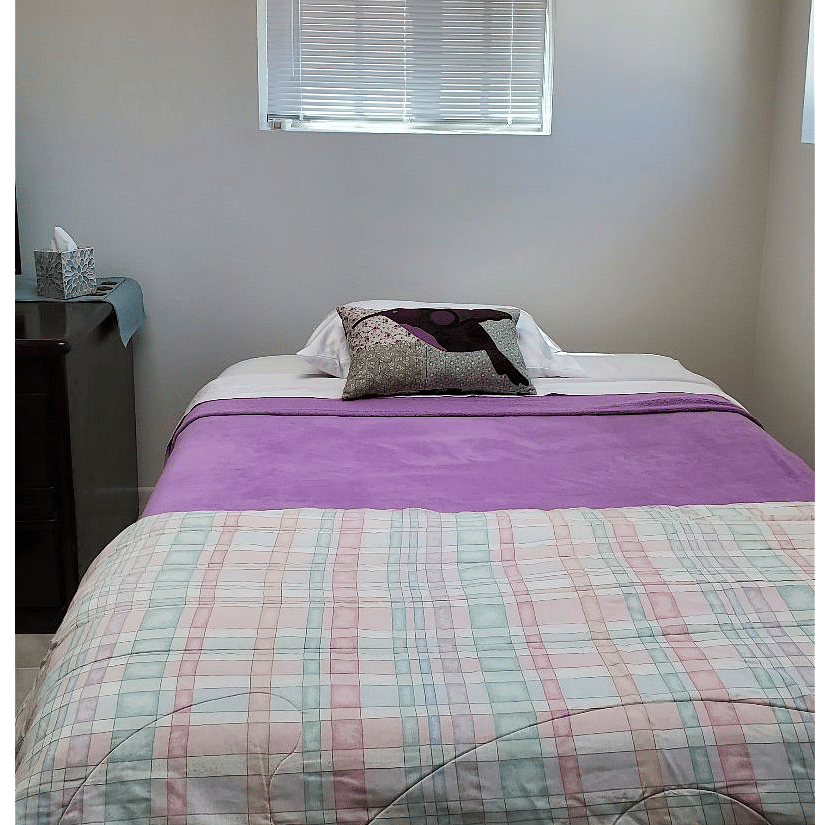 Queen-size bed => I can change the color of the blanket and/or the quilt if you do not like these colors. Ironing board & iron, laundry bin, extra blankets in closet.