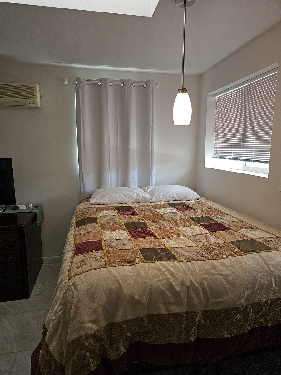Queen-size bed. ironing board & iron, laundry bin, extra blankets in closet.