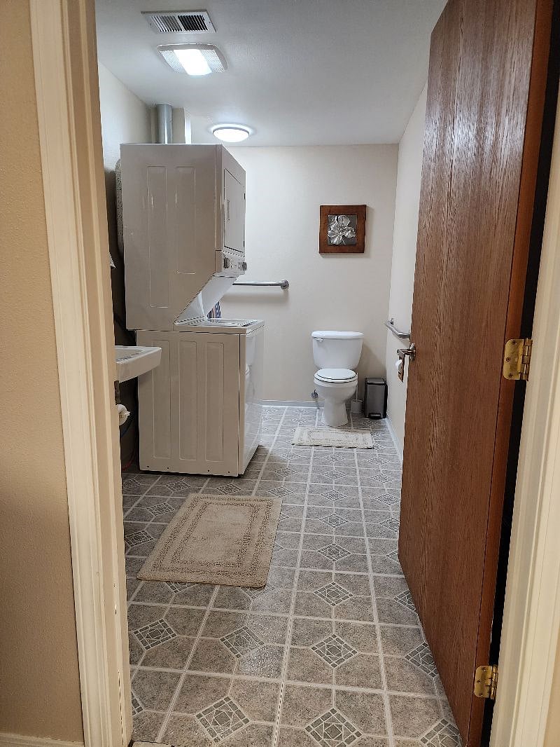 Second bathroom with laundry