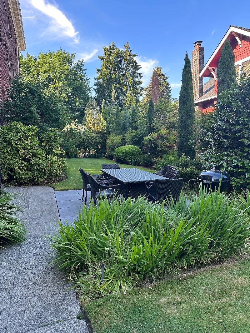 Side yard with table and bbq