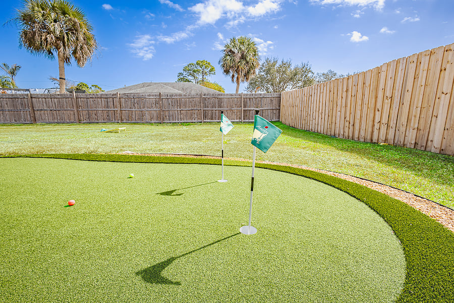 Private four-hole putting green right in the backyard. A unique amenity you won't find at other furnished rentals.