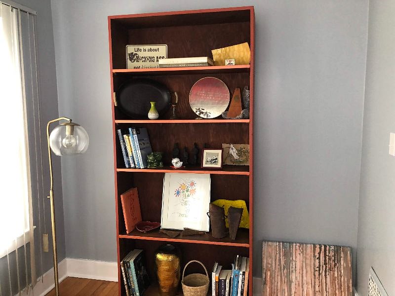 Shelving in alcove with unique tchotchkes