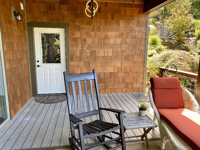 Your private deck and entrance with views of the Lake and Canadian Rockies