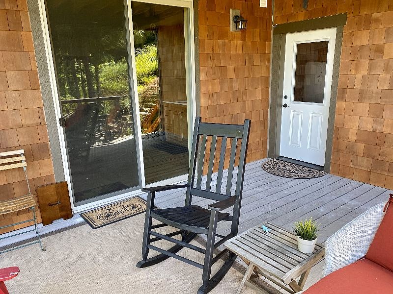 Your private deck and entrance with views of the Lake and Canadian Rockies