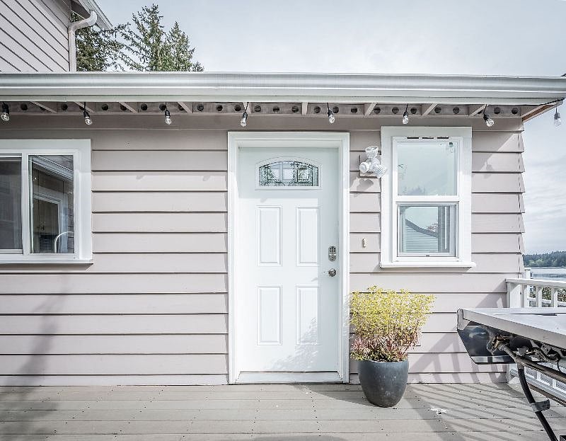 Main entry door with smart lock.