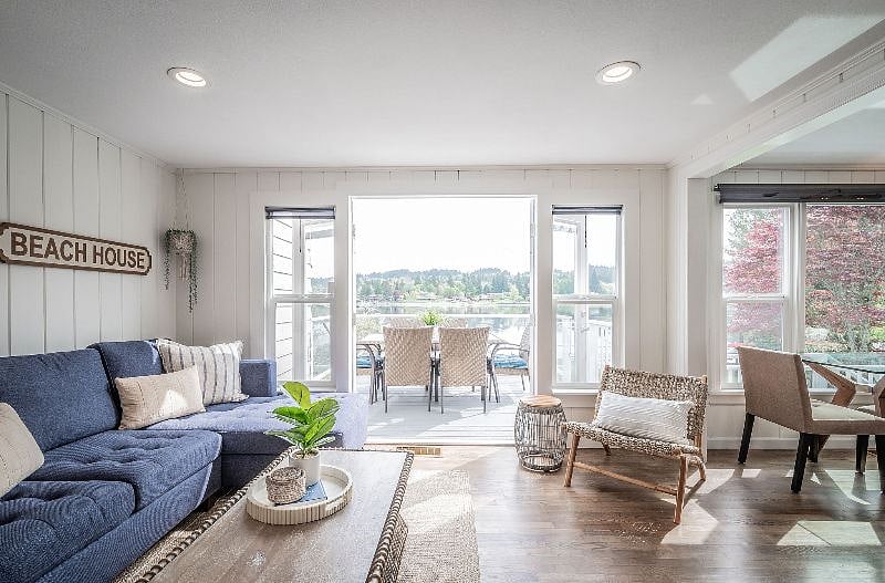 Living Room with French Doors to upper patio with outdoor dining table