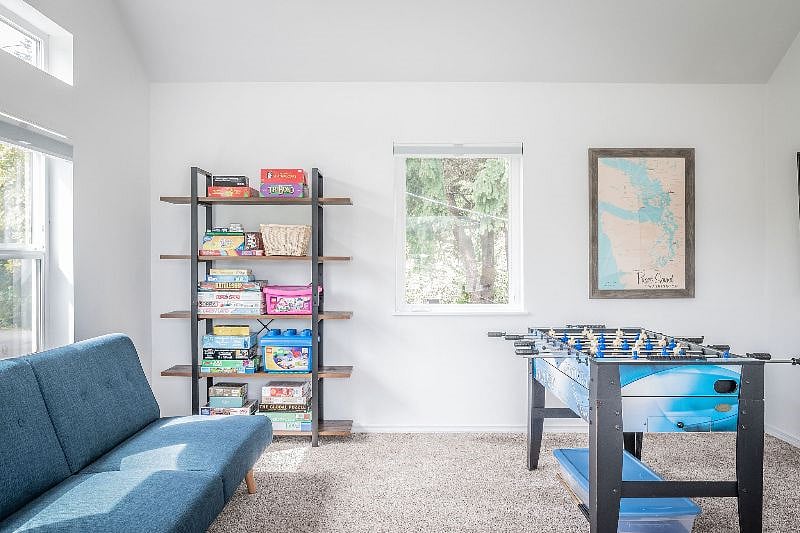 Loft area with games and office desk