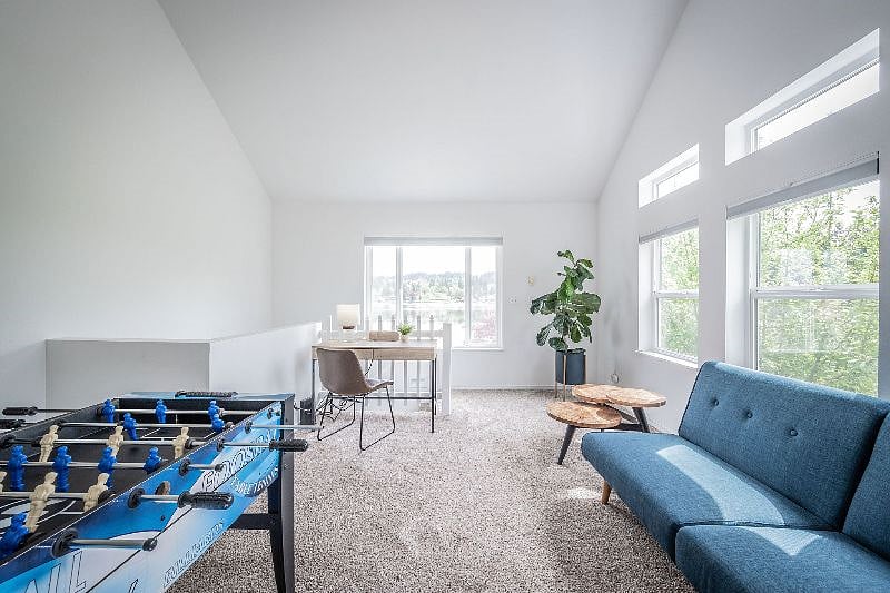 Loft area with games and office desk