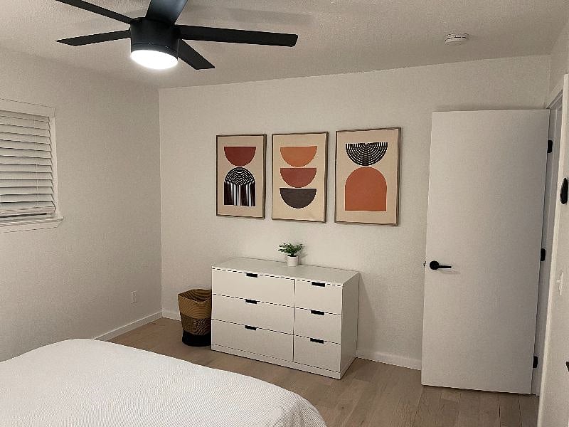 Bedroom 2 with queen bed and closet