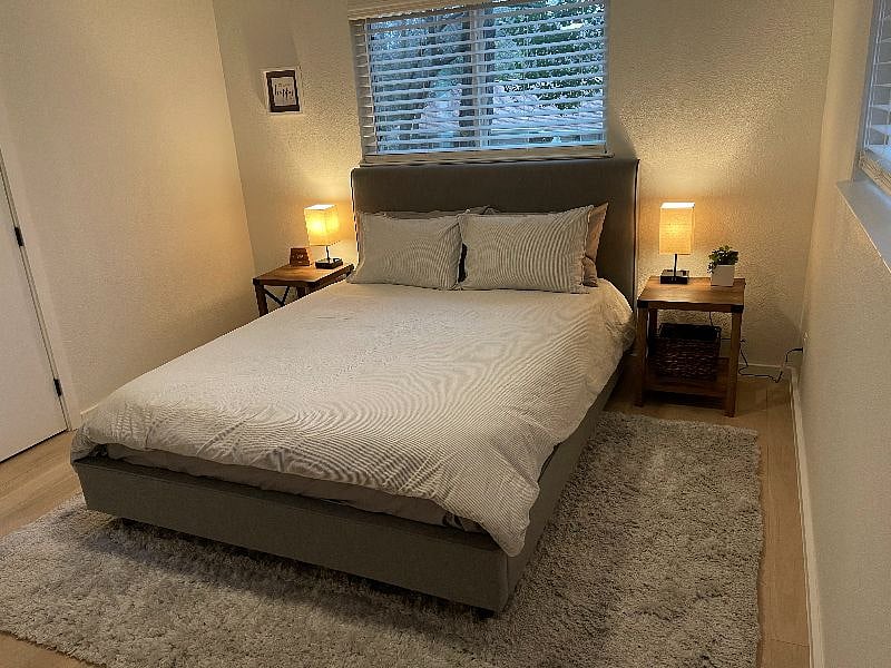 Bedroom 2 with queen bed and closet