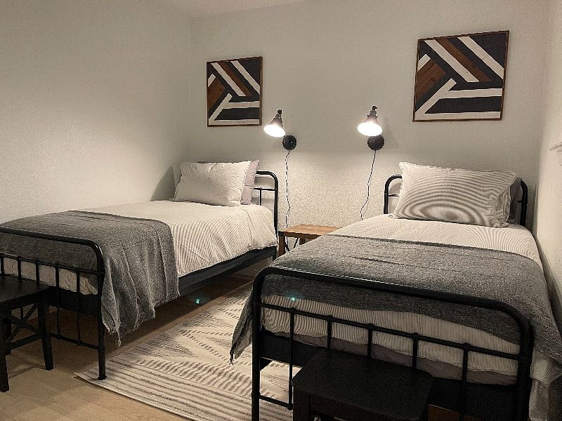 Bedroom 3 with two twin beds and closet