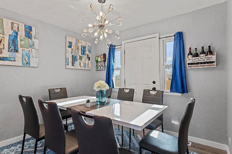 Share delicious dishes with loved ones at the 8-seater dining table.